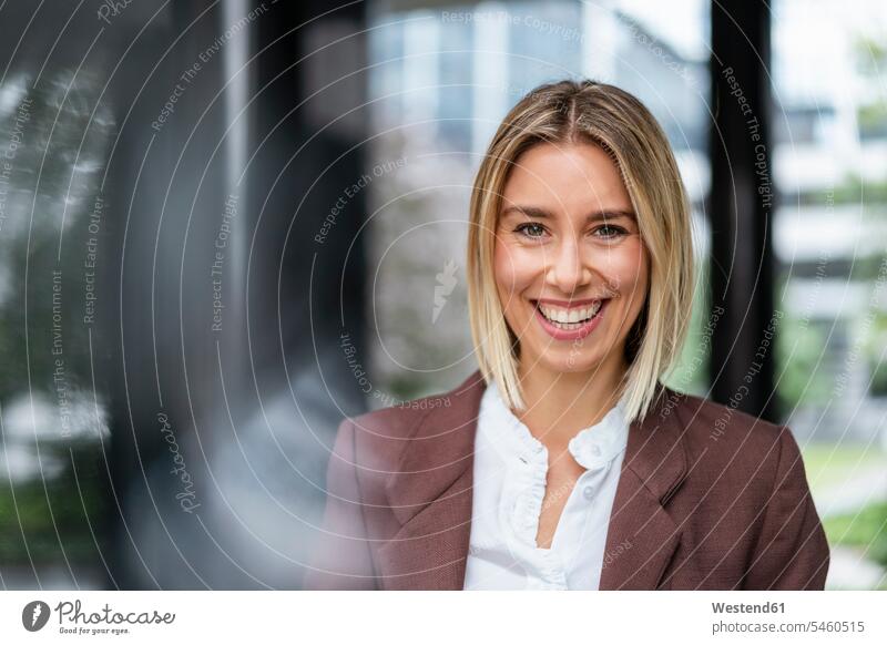 Portrait of happy young businesswoman in the city human human being human beings humans person persons caucasian appearance caucasian ethnicity european 1