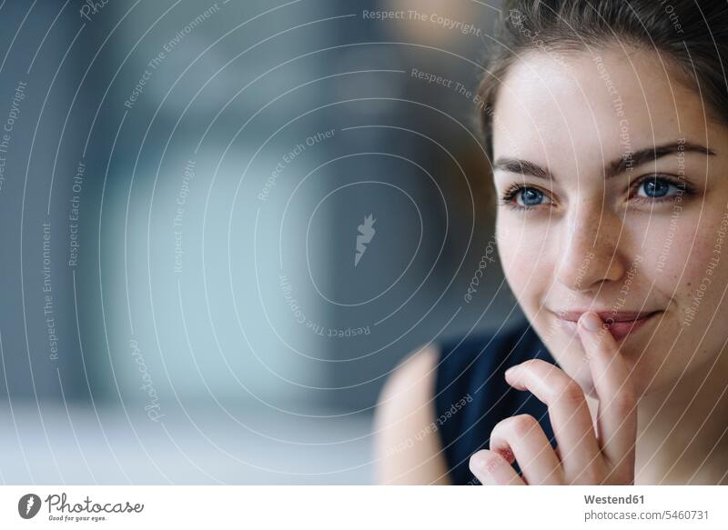 Portrait of smiling young woman looking at distance business life business world business person businesspeople business woman business women businesswomen