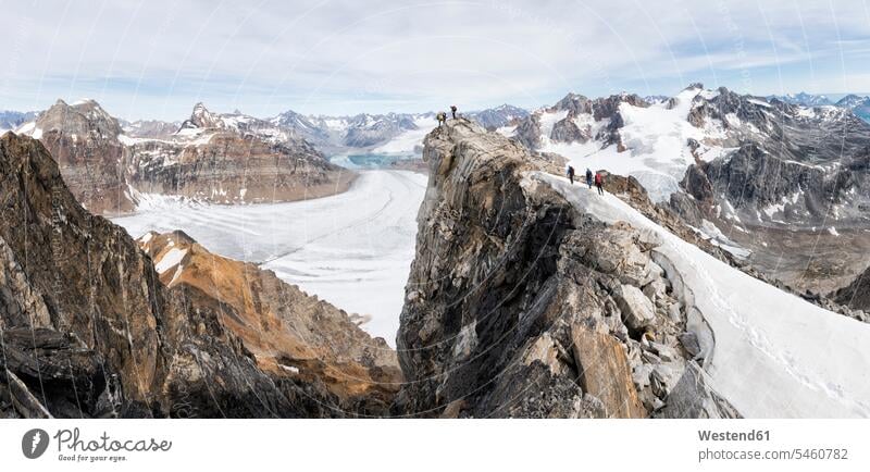 Greenland, Sermersooq, Kulusuk, Schweizerland Alps, group of mountaineers on summit group of people Group groups of people climber alpinists climbers