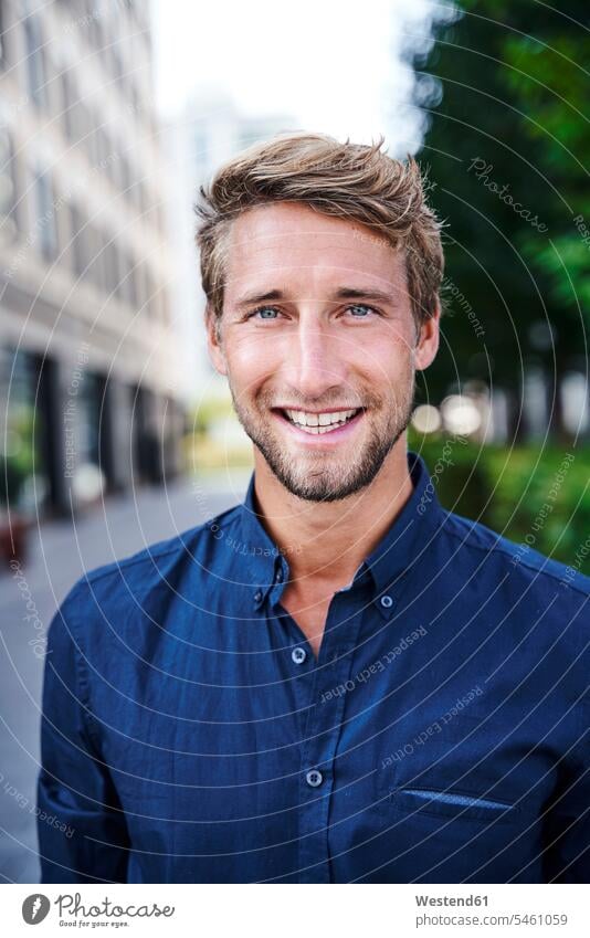 Portrait of smiling young businessman in the city business life business world business person businesspeople Business man Business men Businessmen shirts smile