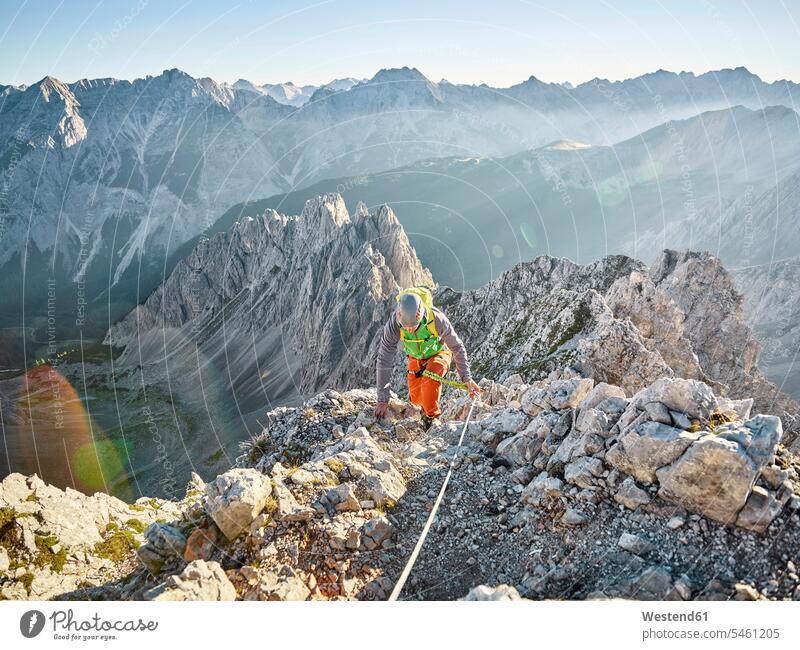 Austria, Tyrol, Innsbruck, mountaineer at Nordkette via ferrata Adventure adventurous Adventures climbing rock climbing alpinism sport sports mountaineering