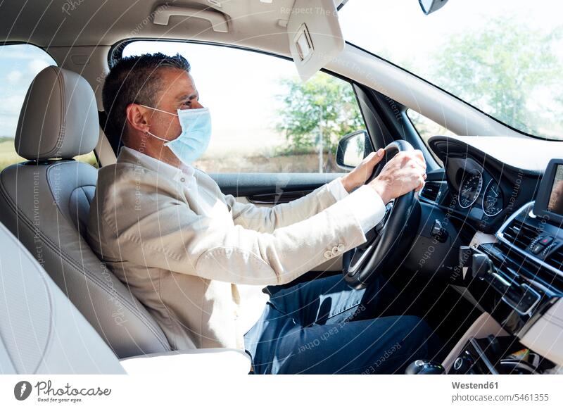 Portrait of man in car wearing protective mask human human being human beings humans person persons caucasian appearance caucasian ethnicity european 1