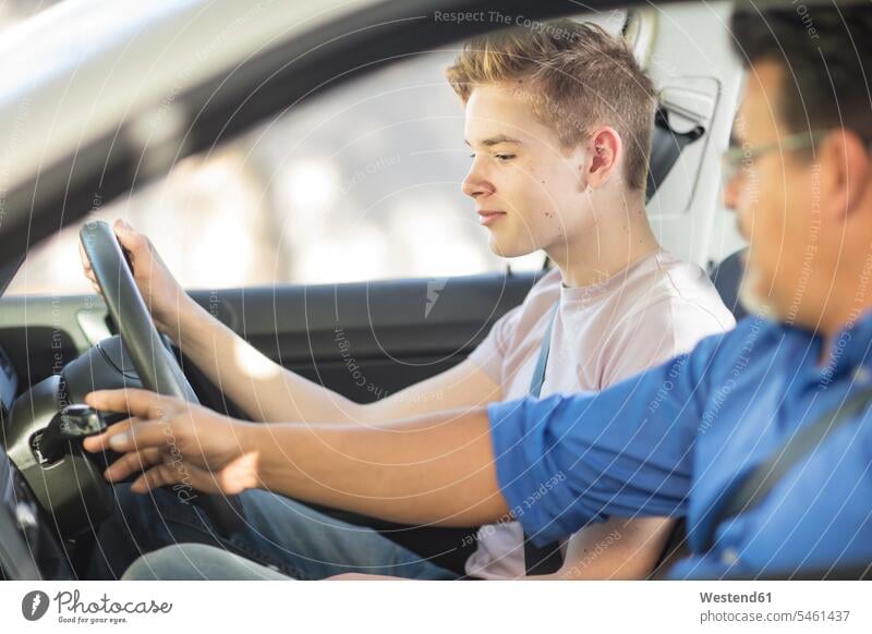 Learner driver with instructor in car automobile Auto cars motorcars Automobiles driving school Learning To Drive learner driver student driver