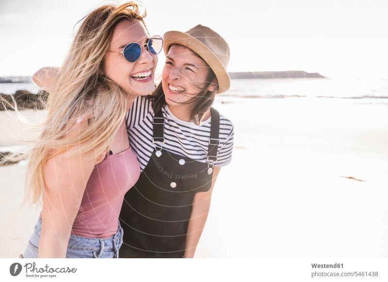 Two girlfriends having fun, walking on the beach human human being human beings humans person persons caucasian appearance caucasian ethnicity european 2