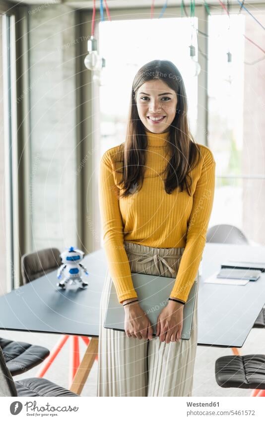 Portrait of confident young businesswoman in office human human being human beings humans person persons caucasian appearance caucasian ethnicity european 1