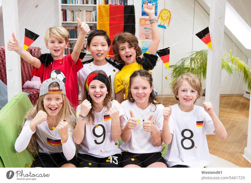 Group of kids watching soccer world championship, cheering football together friends home at home gesture gesturing sitting Seated jubilate rejoicing rejoice