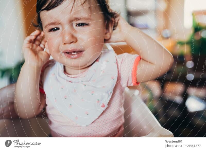Portrait of crying baby girl at home infants nurselings babies portrait portraits baby girls female negative Emotion Feeling Feelings Sentiments Emotions