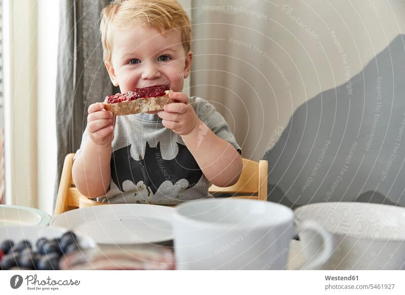 Portrait of little boy eating bread with jam T- Shirt t-shirts tee-shirt laid tables set table learn relax relaxing relaxation delight enjoyment Pleasant