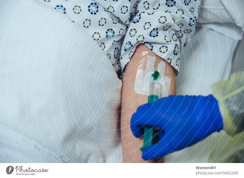 Close-up of patient in hospital receiving an infusion health healthcare Healthcare And Medicines medical medicine disease diseases ill illnesses sick Sickness