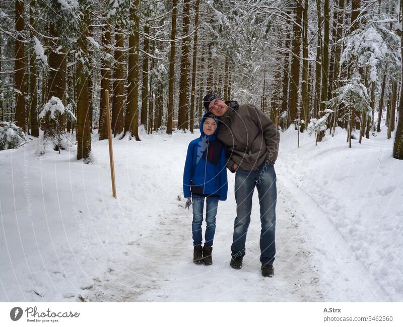 Father and son in winter forest Winter Forest Winter forest Father with child Father and Child Forest walk Walk in the snow Parent with child dad Affiliation