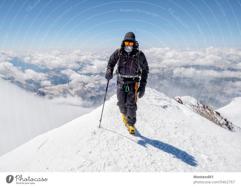 Russia, Upper Baksan Valley, Caucasus, Mountaineer ascending Mount Elbrus mountaineering ascent peak mountain peak mountain peaks Caucasus Mountains