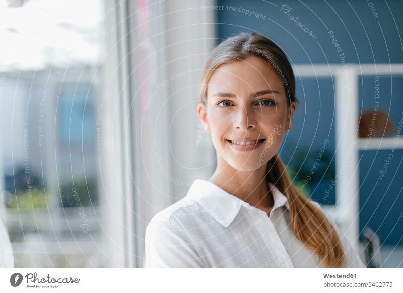 POrtrait of a confident , young woman confidence pretty Prettiness portrait portraits young women smiling smile businesswoman businesswomen business woman