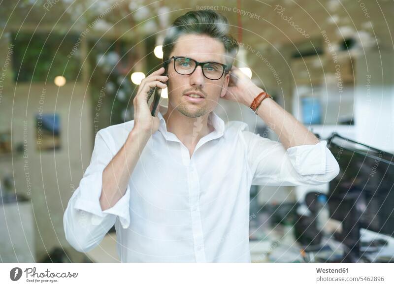 Portrait of businessman on the phone human human being human beings humans person persons caucasian appearance caucasian ethnicity european 1 one person only