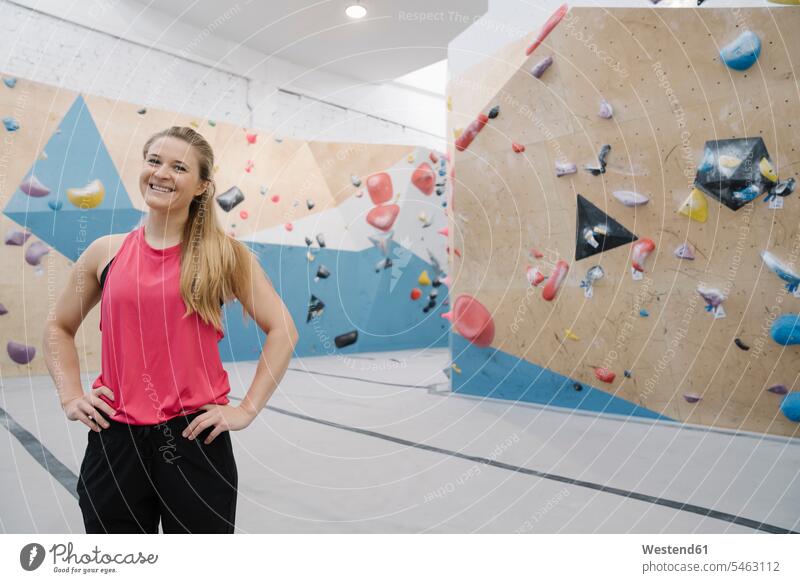 Portrait of a confident woman in climbing gym (value=0) exercise practising train training smile delight enjoyment Pleasant pleasure happy Contented Emotion