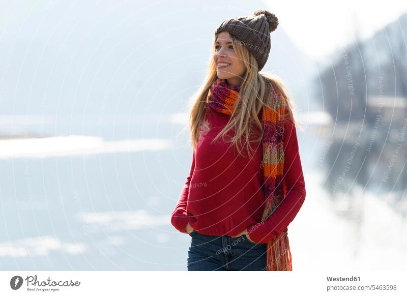 Young blond woman at a lake in winter human human being human beings humans person persons caucasian appearance caucasian ethnicity european adult grown-up