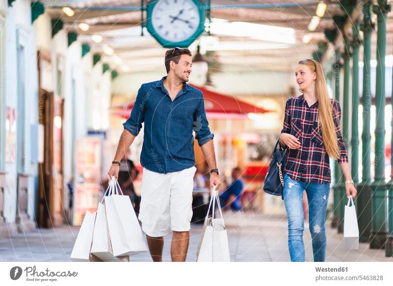 Young couple on a shopping spree human human being human beings humans person persons caucasian appearance caucasian ethnicity european 2 2 people 2 persons two