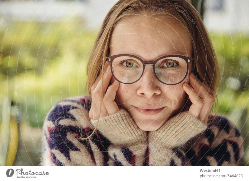 Portrait of young woman with glasses wearing fluffy sweater heads faces human face human faces jumper Sweaters Eye Glasses Eyeglasses specs spectacles relax