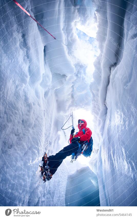 Mountaineer climbing in crevasse, Glacier Grossvendediger, Tyrol, Austria human human being human beings humans person persons caucasian appearance