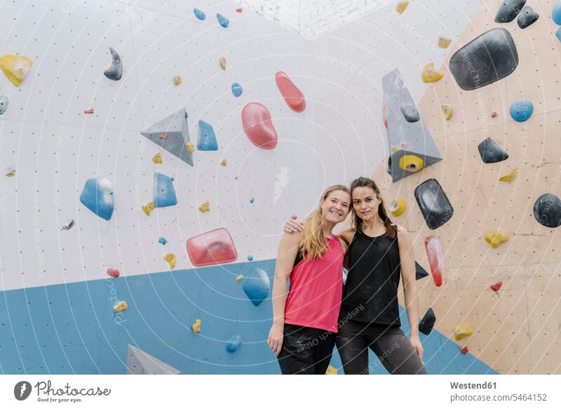 Portrait of two smiling women in climbing gym (value=0) human human being human beings humans person persons caucasian appearance caucasian ethnicity european 2