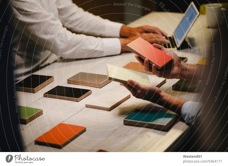 Hands of architects choosing colour samples in office Occupation Work job jobs profession professional occupation business life business world business person