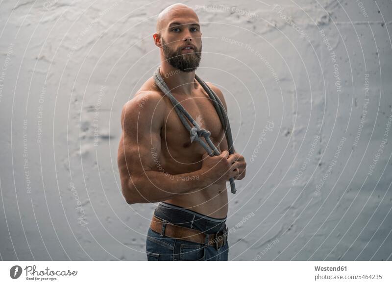 Portrait of a barechested athlete with rope human human being human beings humans person persons bald head baldy Completely Bald ropes hold complacent