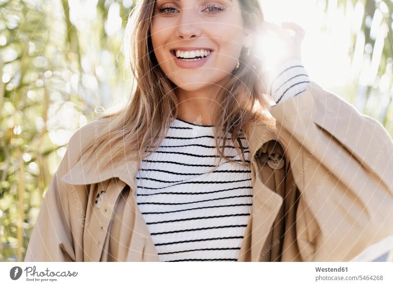 Portrait of young smiling blond woman against sunlight human human being human beings humans person persons caucasian appearance caucasian ethnicity european 1