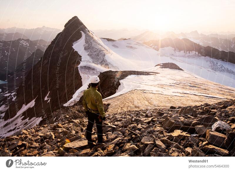 Austria, Tyrol, Stubaital, Stubai Alps, Wilder Pfaff, hiker looking to sunset, Zuckerhuetl left sunsets sundown nature experience mountaineering wanderers