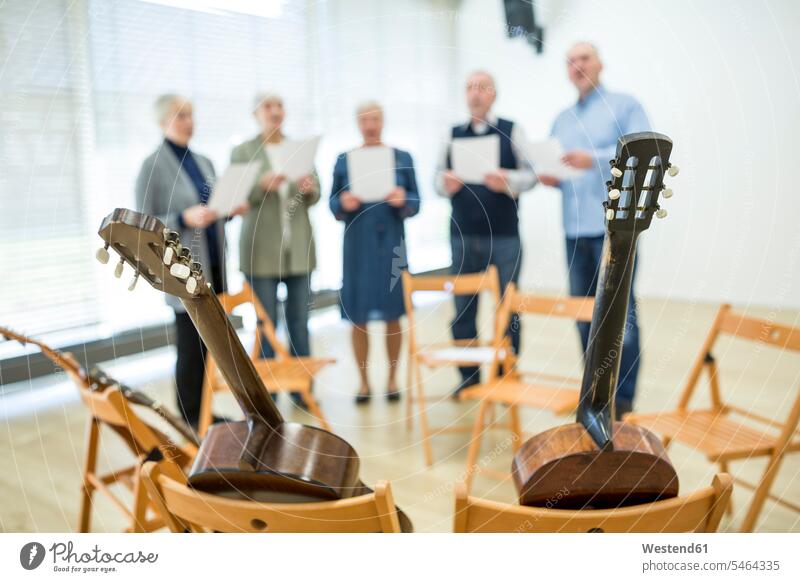 Seniors in retirement home making music singing in choir human human being human beings humans person persons caucasian appearance caucasian ethnicity european