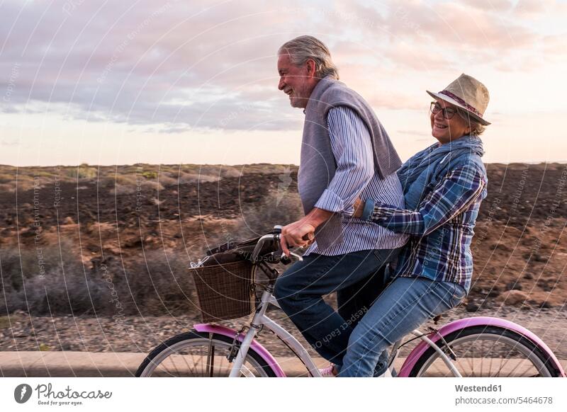 Happy active senior couple on bicycle, Tenerife human human being human beings humans person persons caucasian appearance caucasian ethnicity european 2