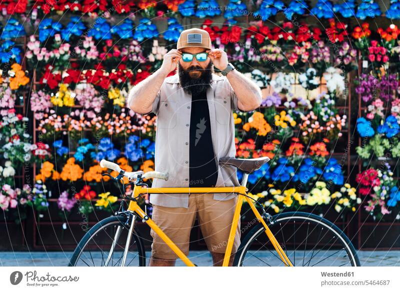 Portrait of bearded man with fixie bike wearing mirrored sunglasses human human being human beings humans person persons caucasian appearance