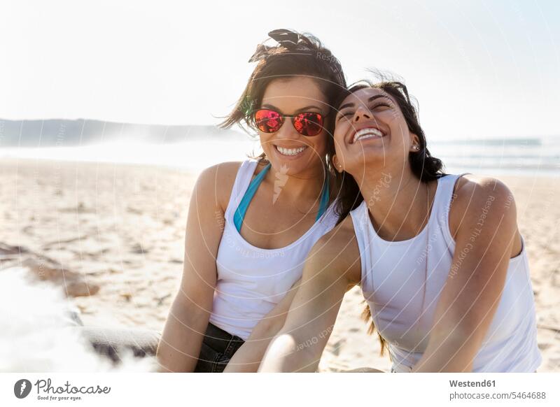 Portrait of two happy female friends on the beach human human being human beings humans person persons caucasian appearance caucasian ethnicity european adult