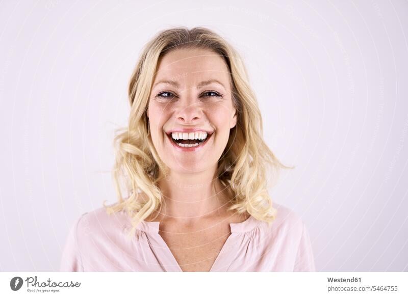 Portrait of laughing blond woman blond hair blonde hair Laughter females women portrait portraits people persons human being humans human beings positive