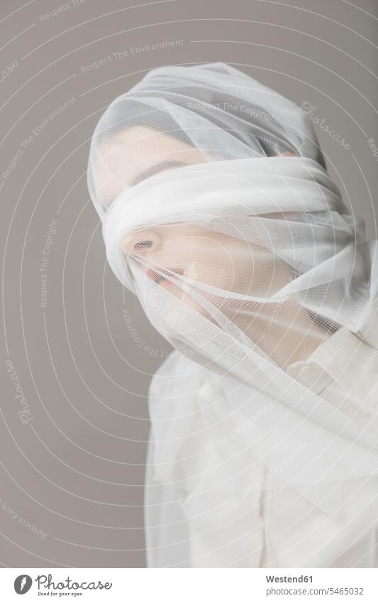 Blindfold woman, wrapped in a veil blindfold young women young woman veils females Adults grown-ups grownups adult people persons human being humans