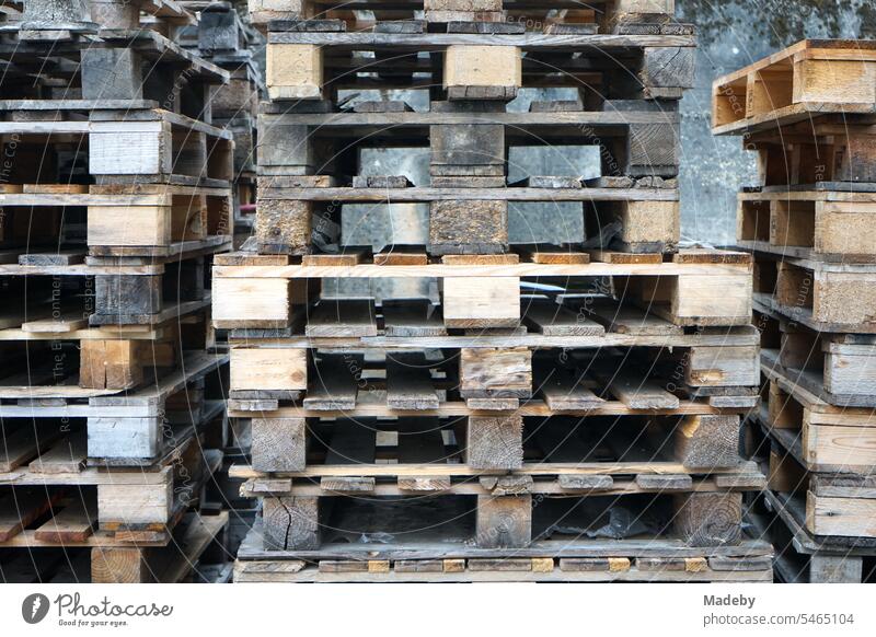 Stacked old wooden euro pallets in the yard of a winegrower in Traben-Trarbach on the Moselle River in the Bernkastel-Wittlich district of Rhineland-Palatinate, Germany