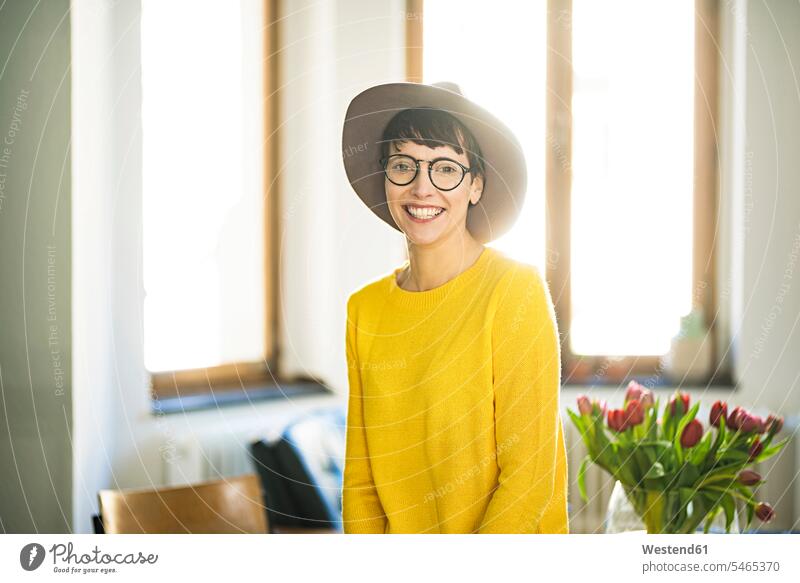 Portrait of happy stylish woman at home portrait portraits apartment flats apartments happiness females women Adults grown-ups grownups adult people persons