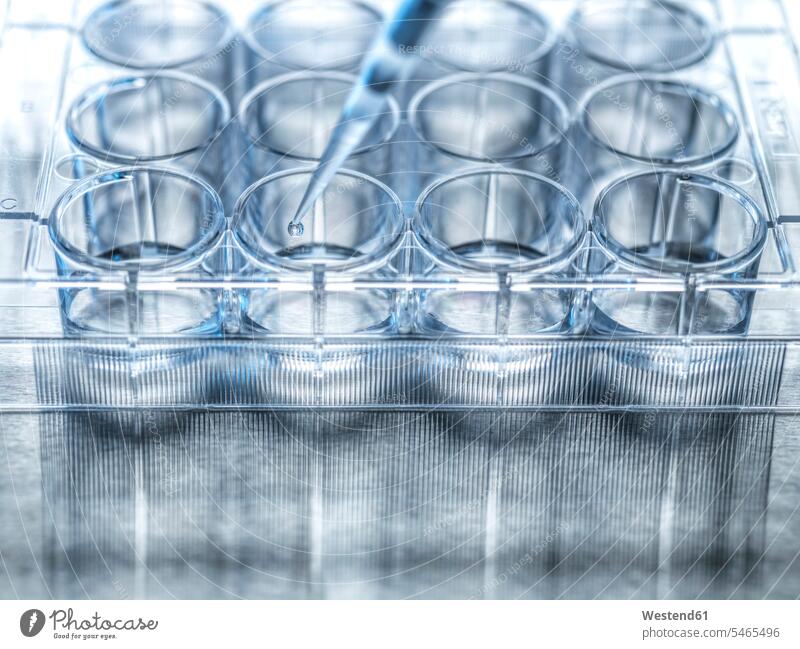 Medical sample being pipetted into microplate close-up close up closeup close ups close-ups closeups science scientific sciences Innovation Progress