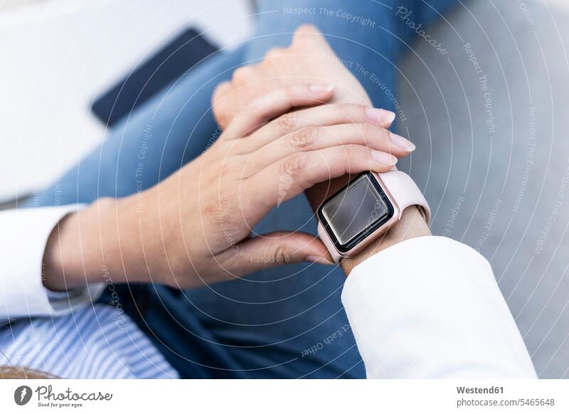 Businesswoman checking smartwatch, close up occupation profession professional occupation jobs wireless Wireless Connection Wireless Technology