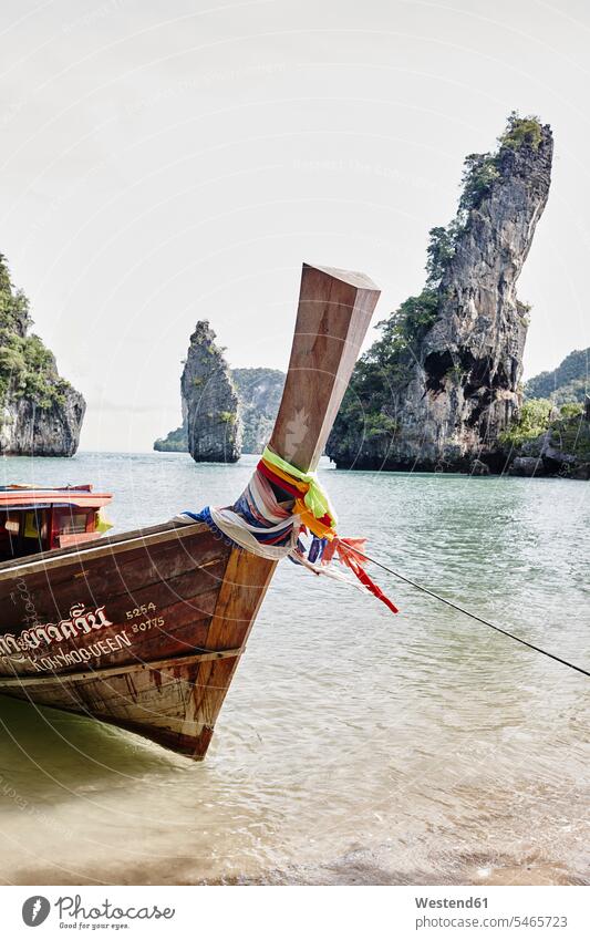 Thailand, Phang Nga Bay, moored long-tail boat rock formation Rock Formations outdoors outdoor shots location shot location shots longtail boat rope ropes boats