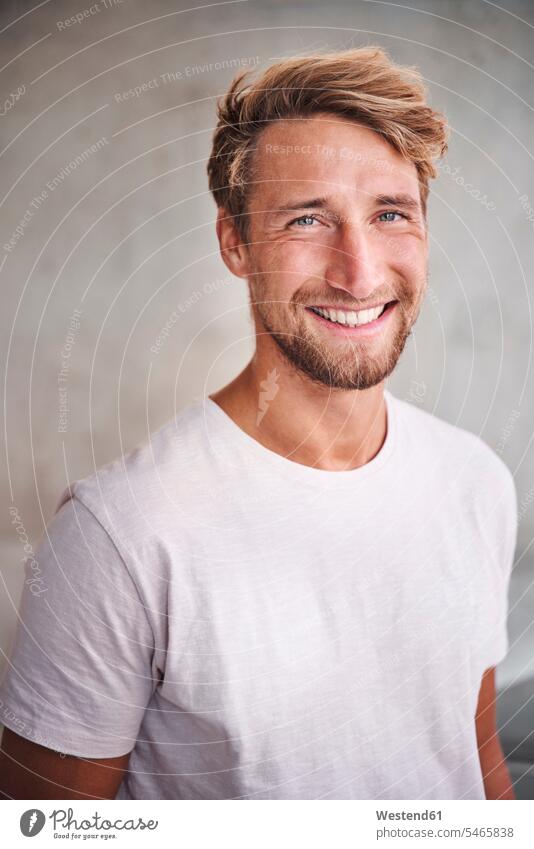 Portrait of happy young man wearing white t-shirt human human being human beings humans person persons caucasian appearance caucasian ethnicity european 1