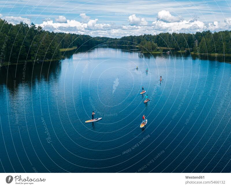 Aerial view of paddleboarders in Vuoksi river outdoors location shots outdoor shot outdoor shots day daylight shot daylight shots day shots daytime aerial view