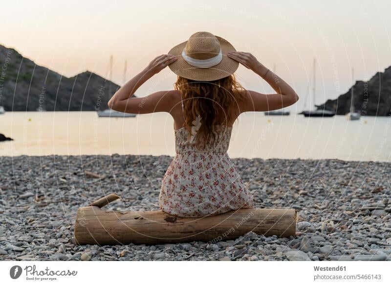 Young woman enjoying beach at sunset human human being human beings humans person persons caucasian appearance caucasian ethnicity european 1 one person only