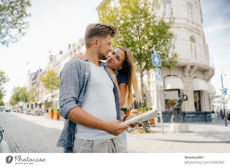 Netherlands, Maastricht, happy young couple exploring the city happiness town cities towns twosomes partnership couples Exploration explore outdoors