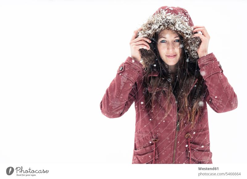 Portrait of young woman wearing hooded jacket in winter hoods seasons hibernal chilly Cold Temperature Cold Weather free time leisure time Lifestyle