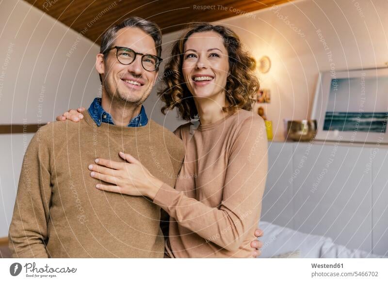 Happy affectionate couple at home human human being human beings humans person persons caucasian appearance caucasian ethnicity european 2 2 people 2 persons