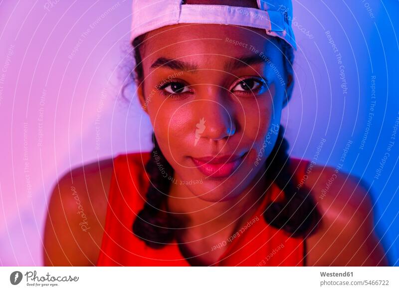 Close-up of teenage girl wearing cap at home color image colour image indoors indoor shot indoor shots interior interior view Interiors day daylight shot