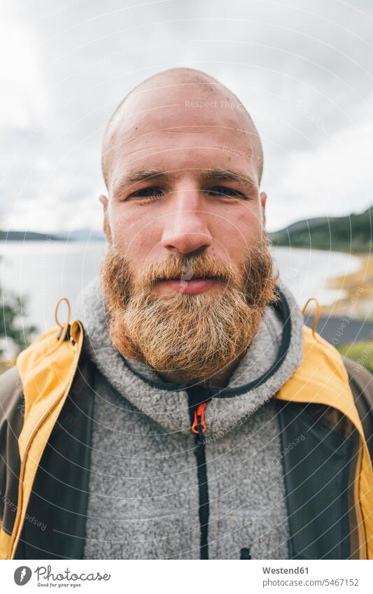 Portrait of a man travelling the Lofoten men males hiker wanderers hikers on the move on the way on the go on the road portrait portraits Traveller Travellers