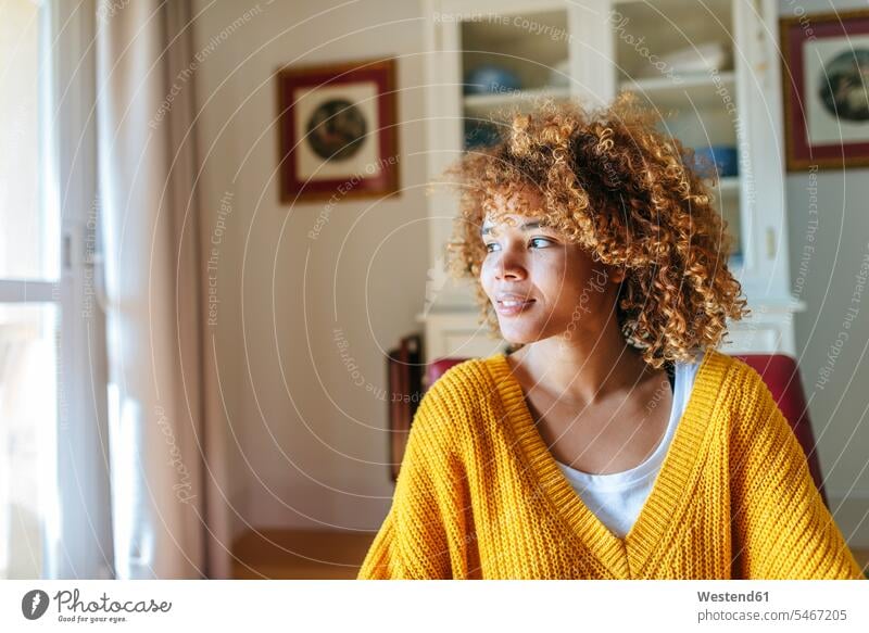 Young woman with curly hair at home females women curls curled Adults grown-ups grownups adult people persons human being humans human beings beautiful flat