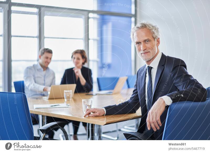Portrait of confident manager during a meeting in office human human being human beings humans person persons caucasian appearance caucasian ethnicity european