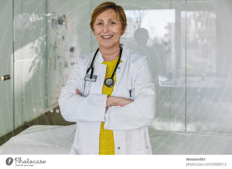 Portrait of confident doctor Occupation Work job jobs profession professional occupation glass panes health healthcare Healthcare And Medicines medical medicine
