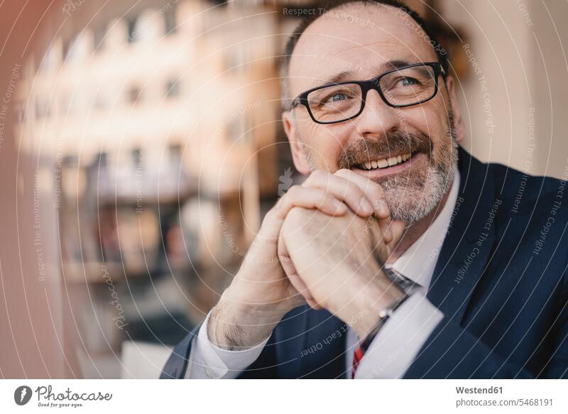Portrait of smiling mature businessman in a cafe human human being human beings humans person persons caucasian appearance caucasian ethnicity european adult